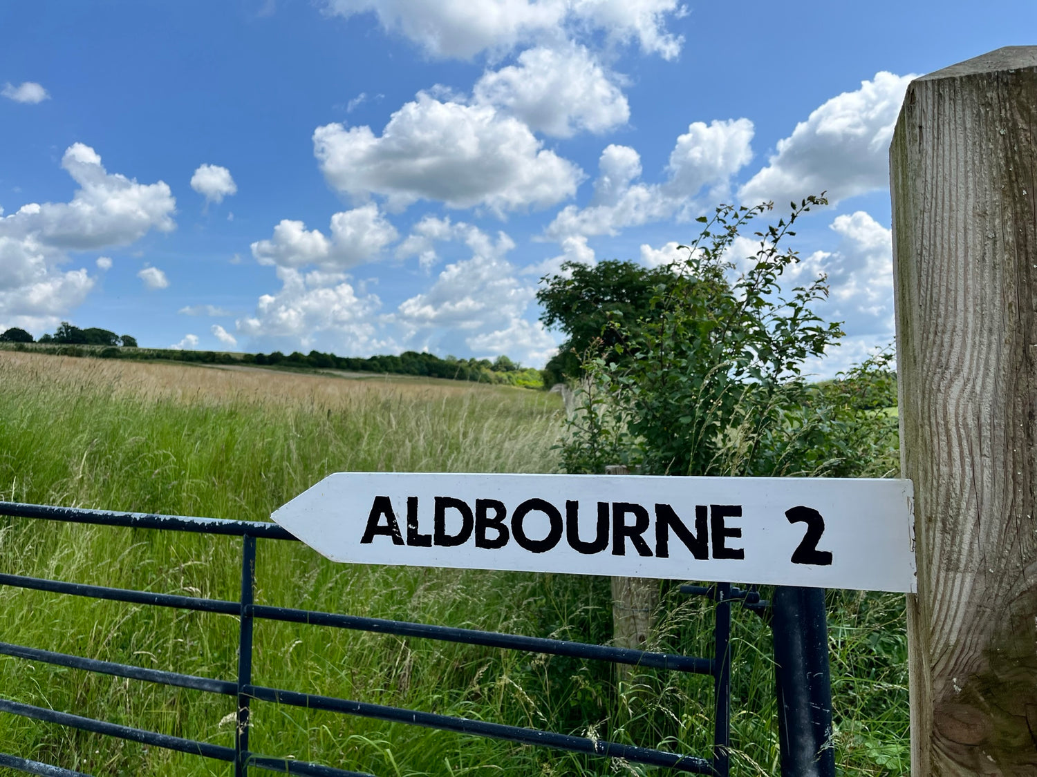 Sign: Just two miles to Aldbourne, England